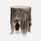 Wooden stool with a natural, textured surface on a white background