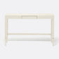 A modern console table with a light beige textured finish, featuring a single drawer, tapered legs, and a lower support rail, shown against a plain white background.