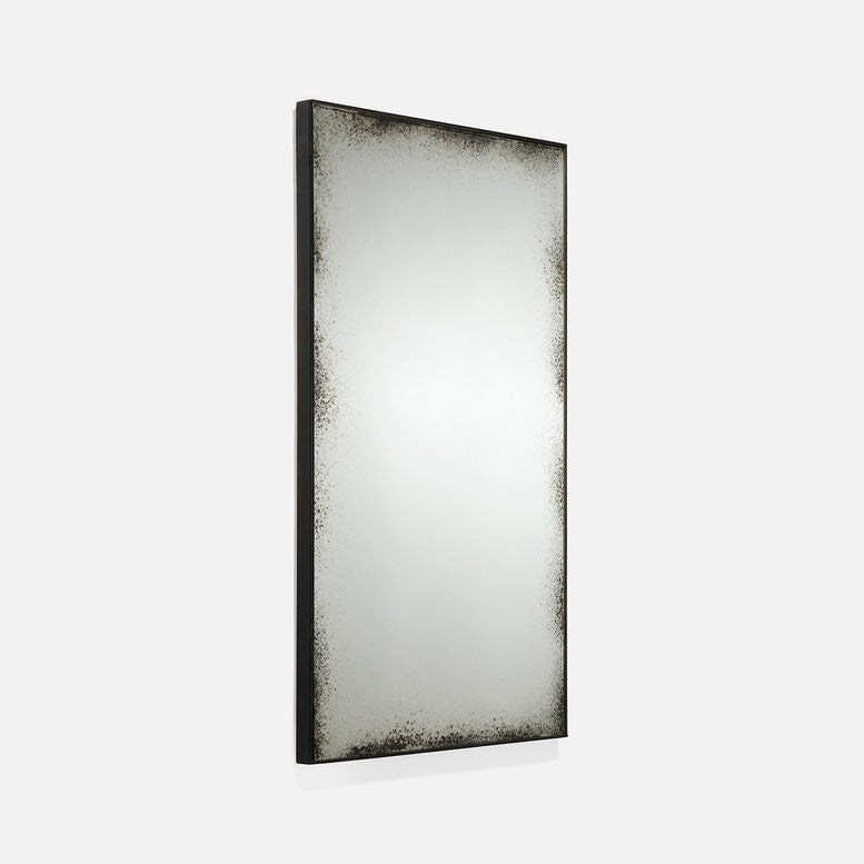 Rectangular mirror with a black frame on a white background