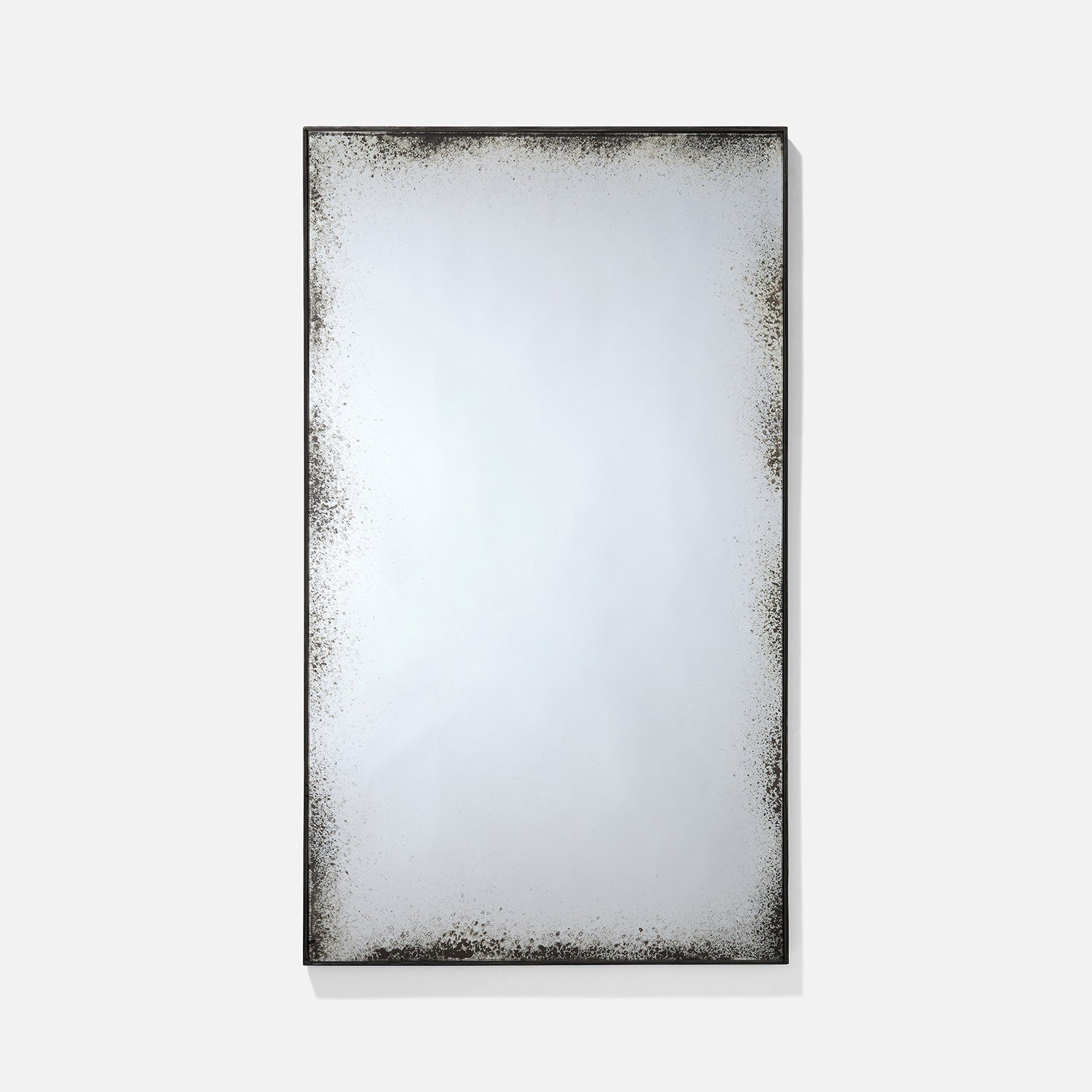 Rectangular mirror with a textured black frame on a white background