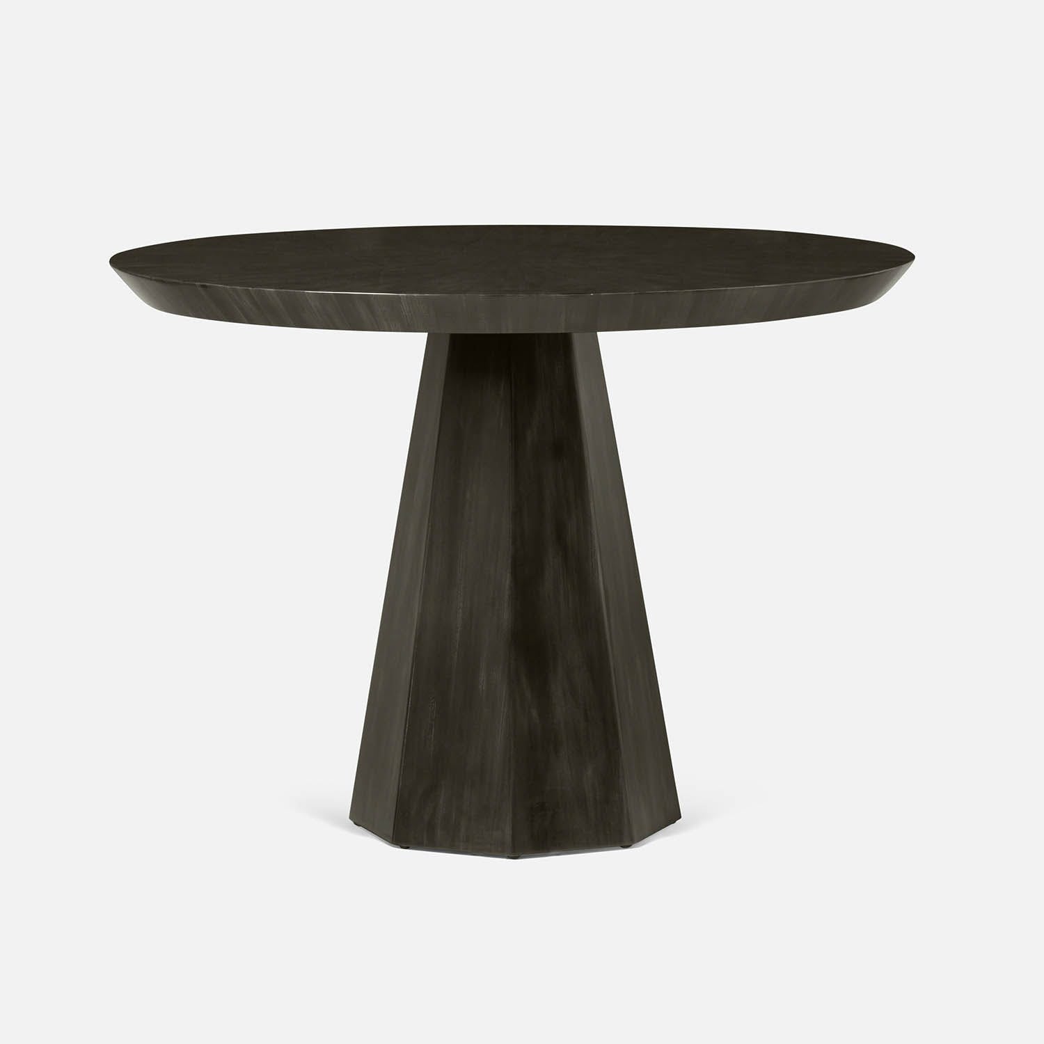 Round dark wooden table with a thick base on a white background