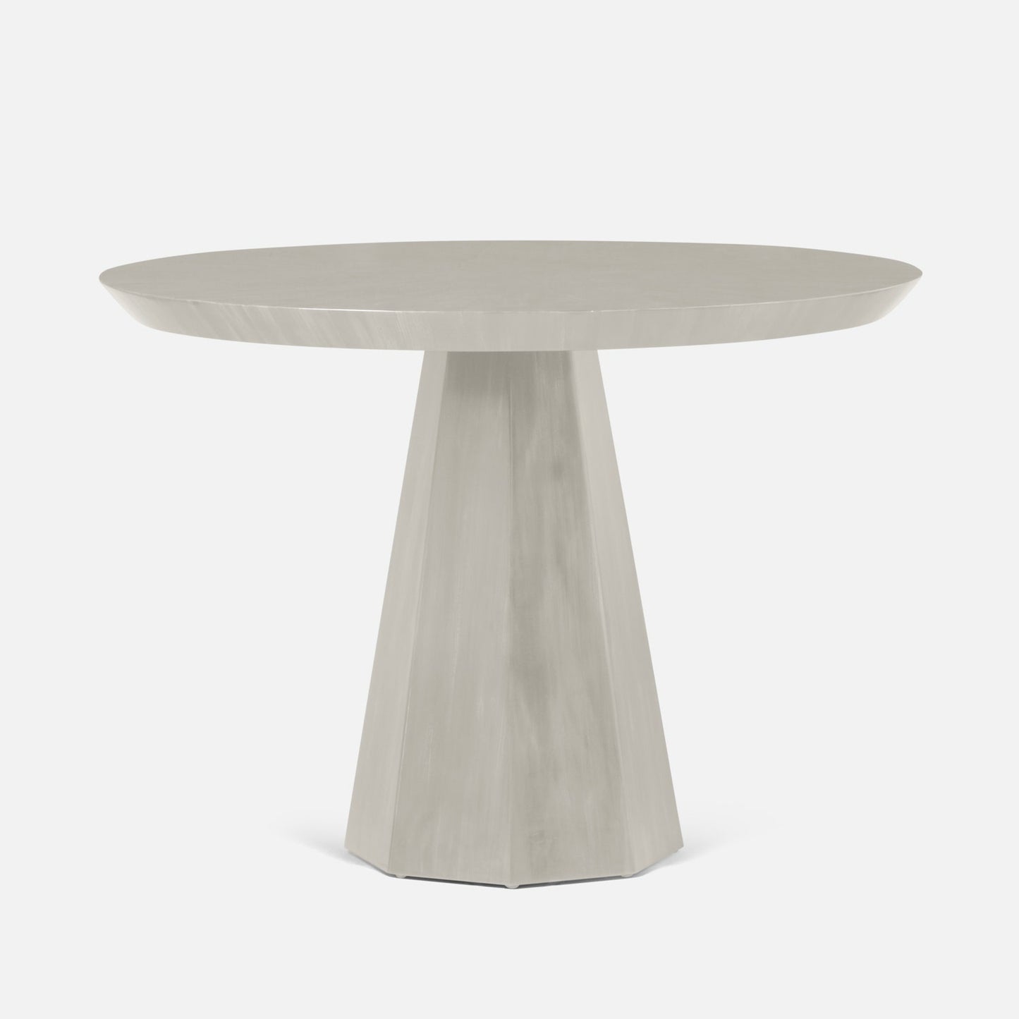 Round concrete table on a white background