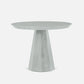 Round white table with a geometric base on a white background