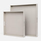 Two french gray trays on a white background