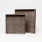 Two brown trays on a white background