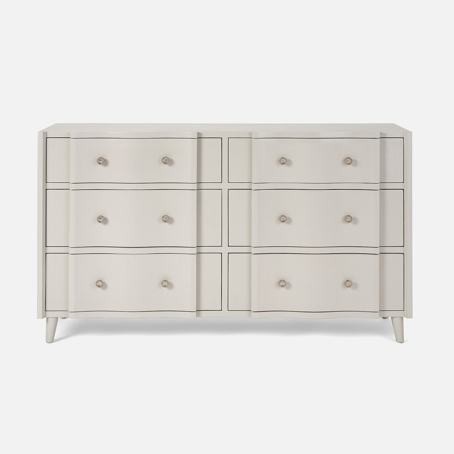 White dresser with multiple drawers on a white background