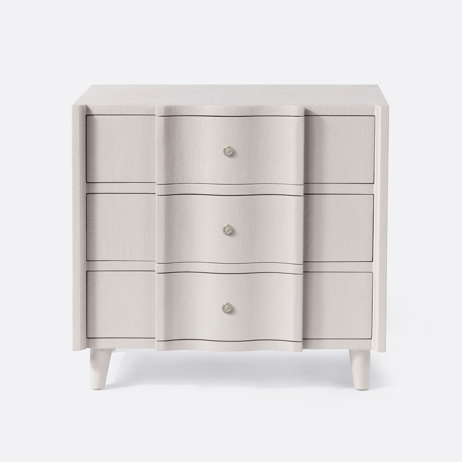 Light gray dresser with three drawers on a white background