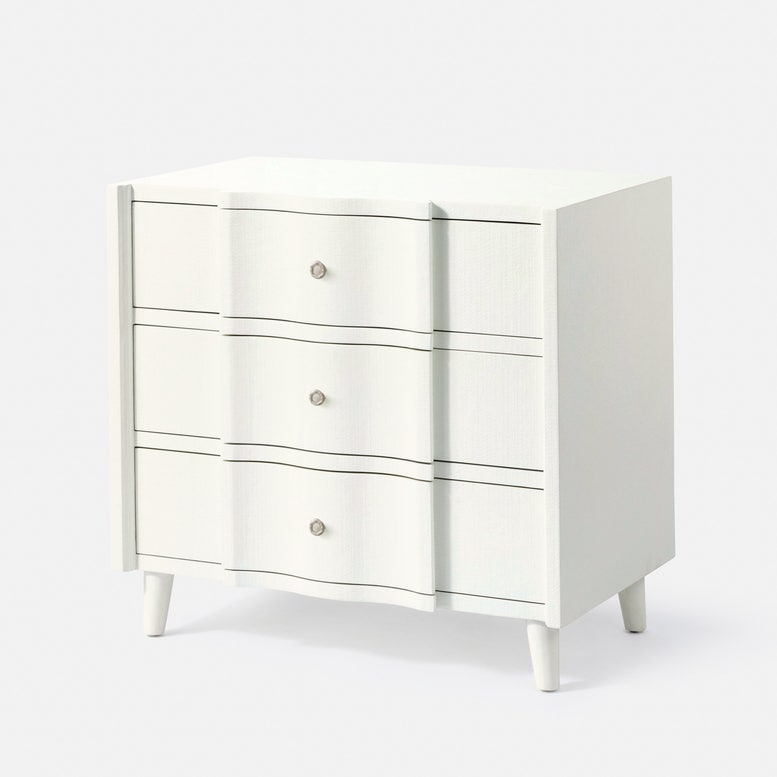 White dresser with three drawers on a white background