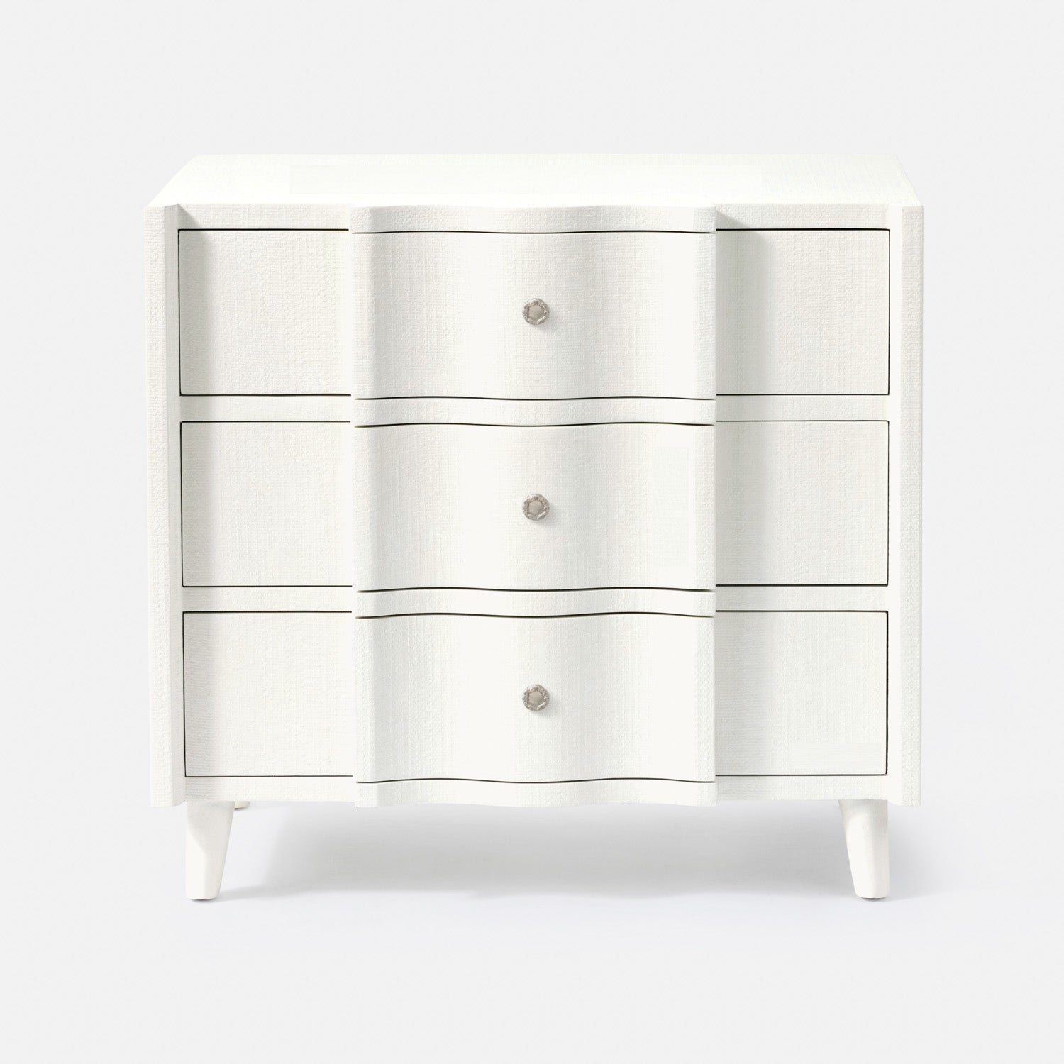 White dresser with three drawers on a white background