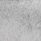 A close-up of a light gray faux fur or sheepskin material with visible hair texture and a central seam running vertically.
