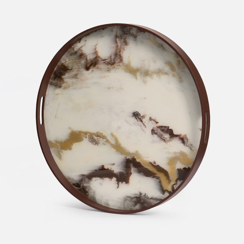 Round marble tray with a brown and white marbled pattern on a light gray background
