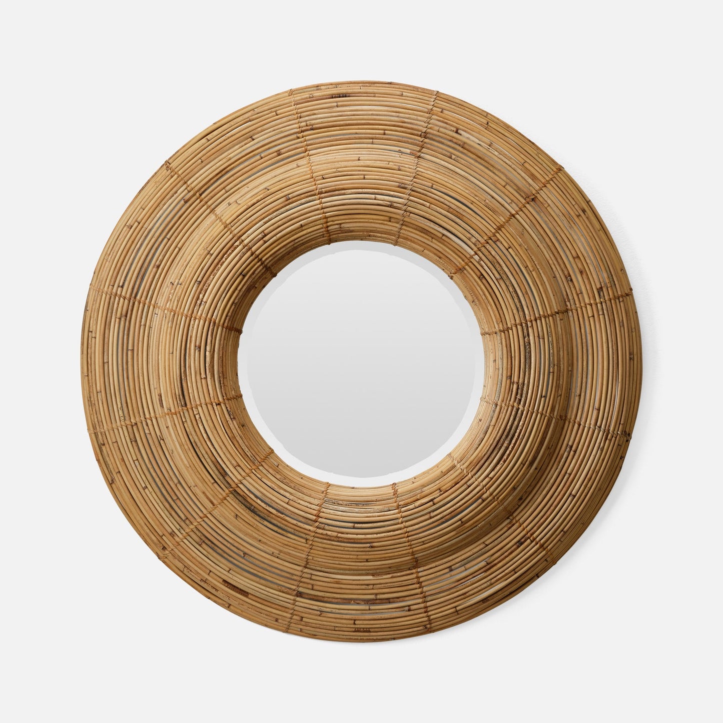 Round mirror with a woven brown frame on a white background