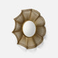 Decorative wall mirror with a gold, fan-like frame on a white background
