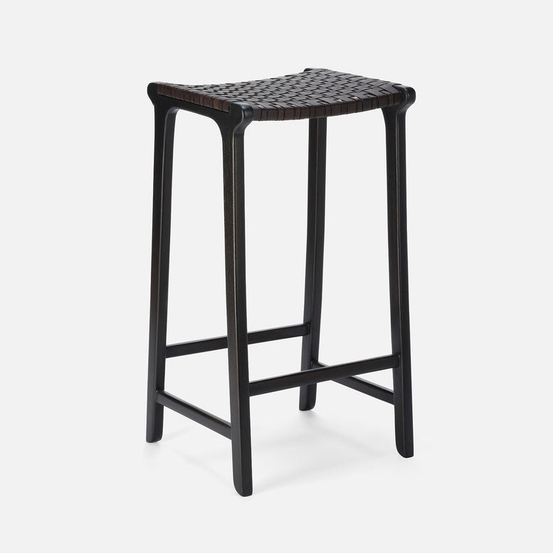 Black woven bar stool on a white background