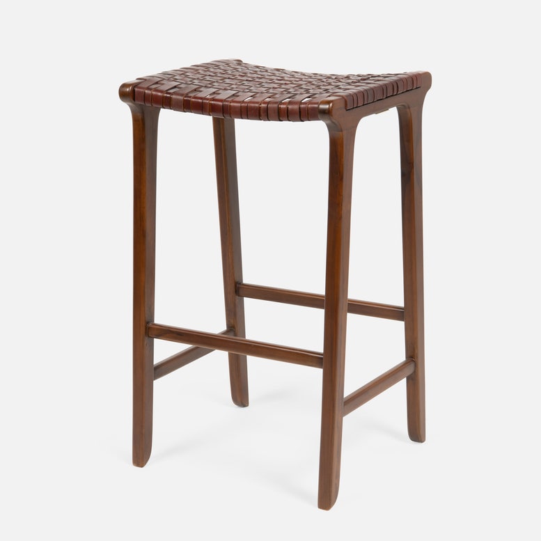 Wooden bar stool with woven seat on a white background