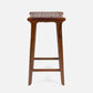 Wooden bar stool with woven seat on a white background