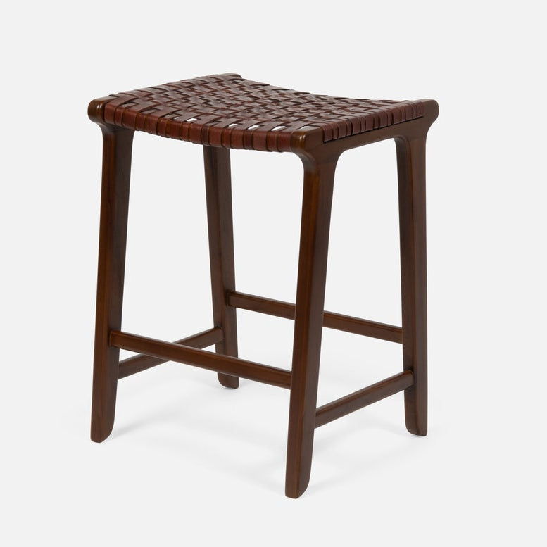 Brown woven stool on a white background