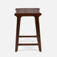 Wooden bar stool with woven seat on a white background