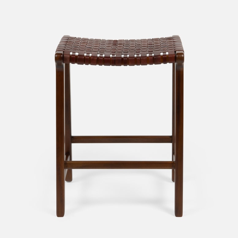 Wooden stool with woven seat on a white background