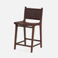 Brown woven bar stool on a white background