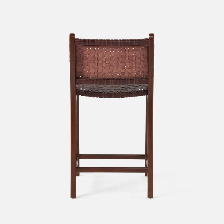 Brown woven chair on a white background