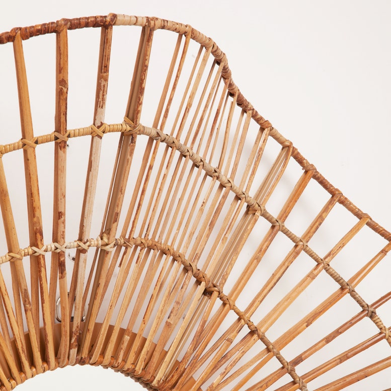 Close-up of a wicker chair with a white background