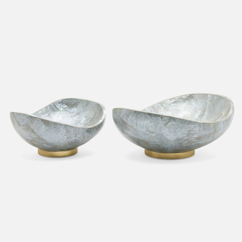 Two gray stone bowls with gold bases on a white background