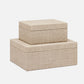 Two beige fabric storage boxes stacked on a white background