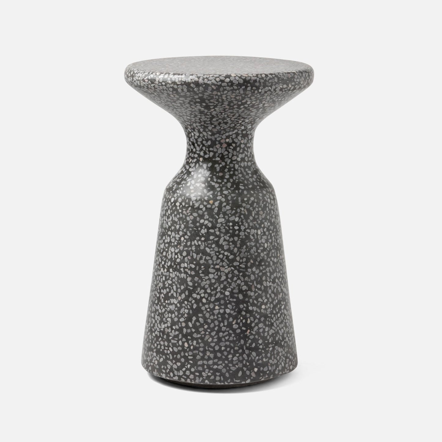 Speckled gray side table on a white background