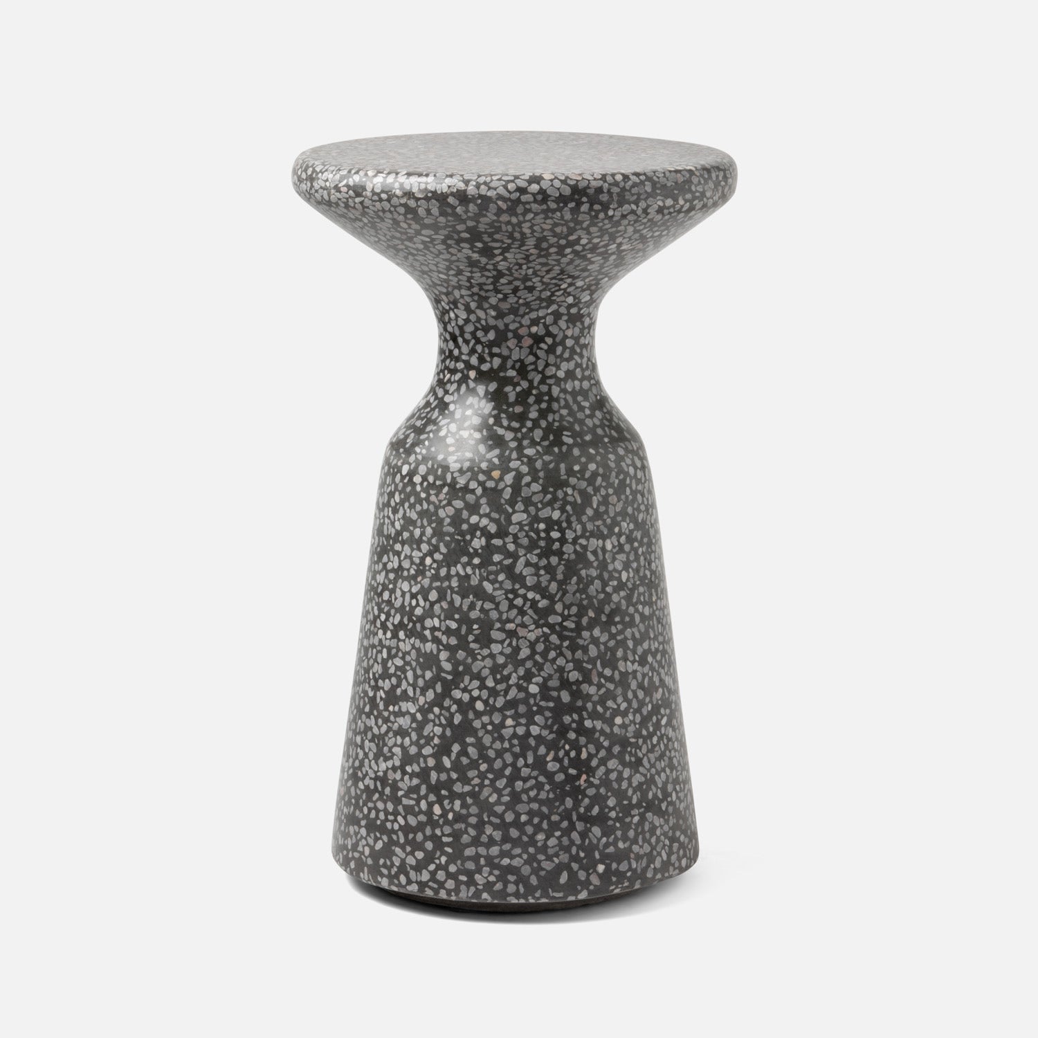 Speckled gray side table on a white background