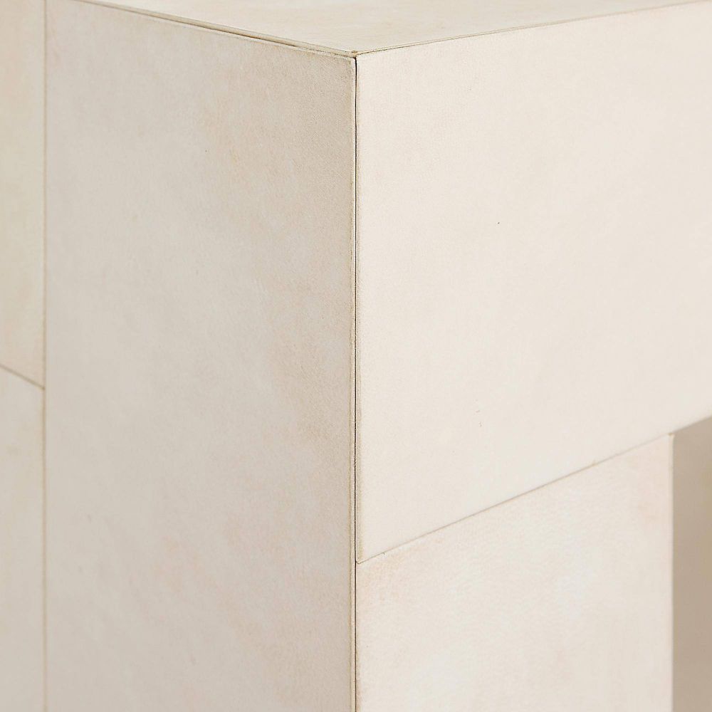 Close-up of beige tiles with a geometric pattern