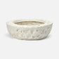 White textured ceramic bowl on a white background