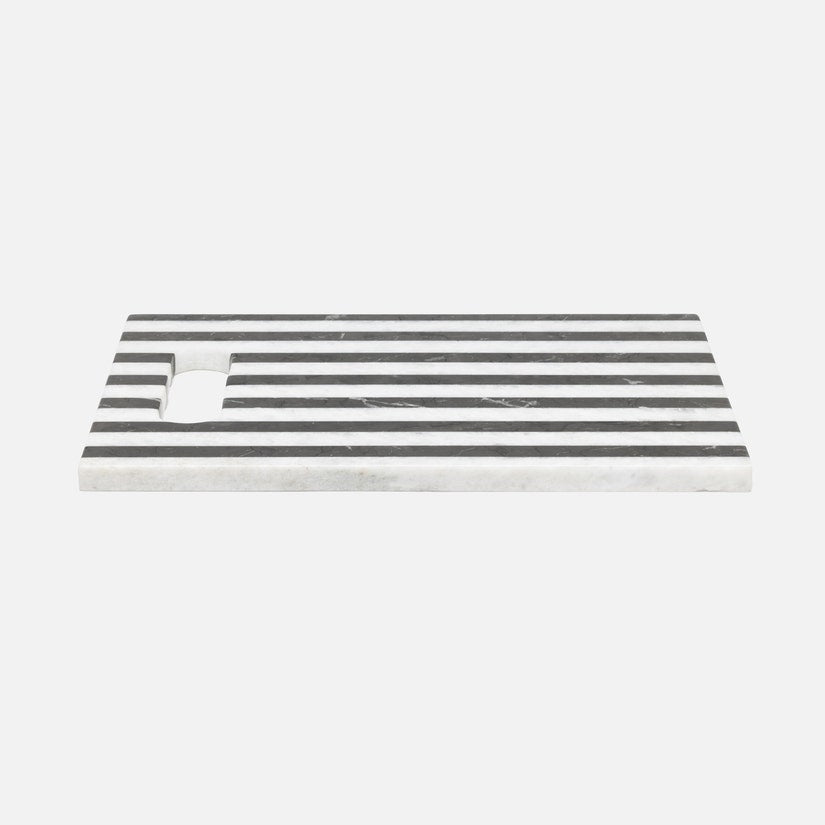Rectangular marble tray with black stripes on a white background