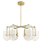 Gold chandelier with glass shades on a white background