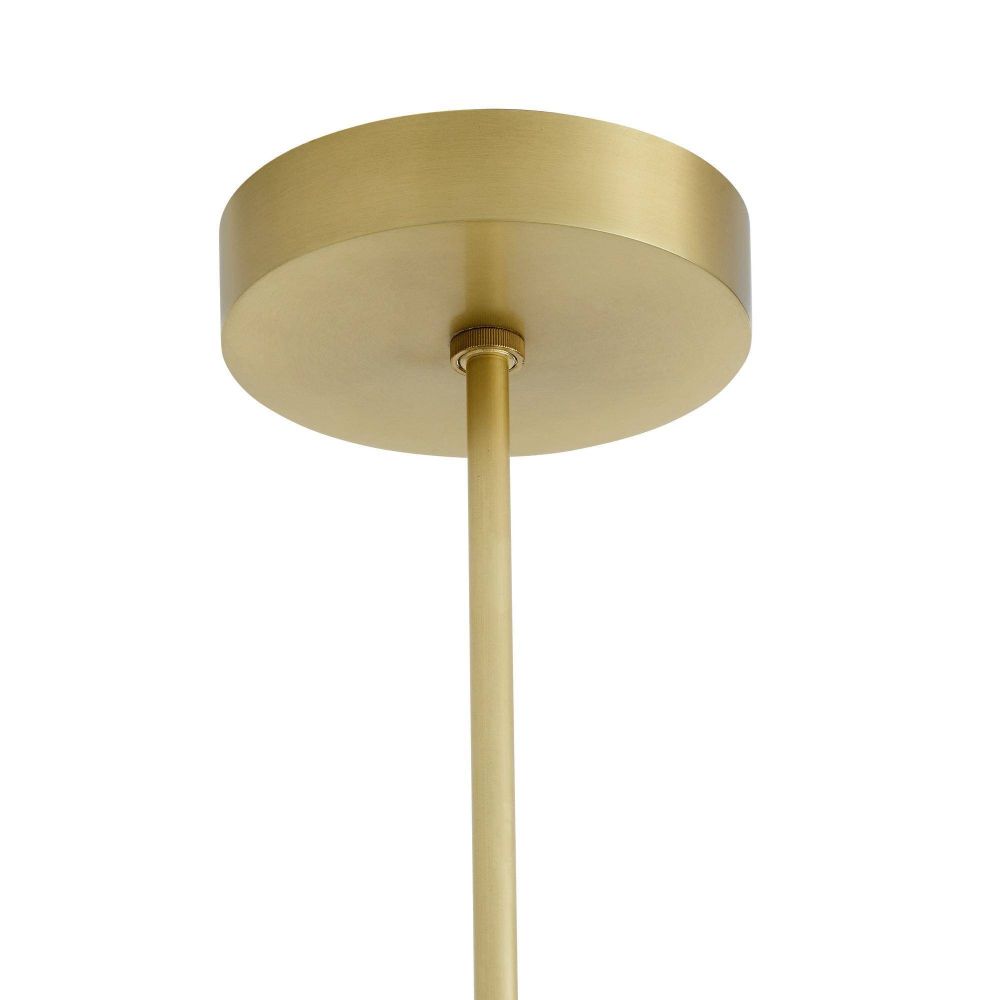Gold pendant light fixture on a white background