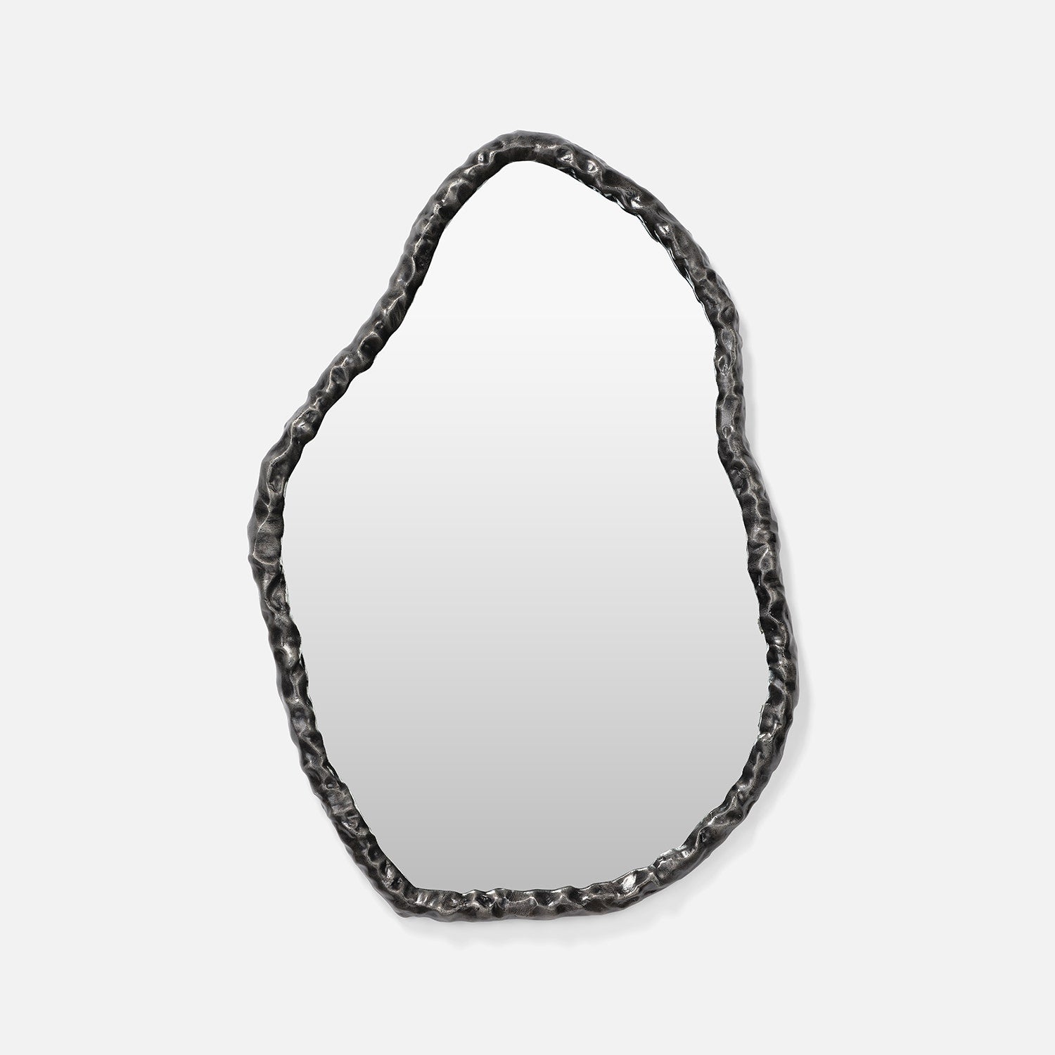 Decorative mirror with a textured black frame on a white background