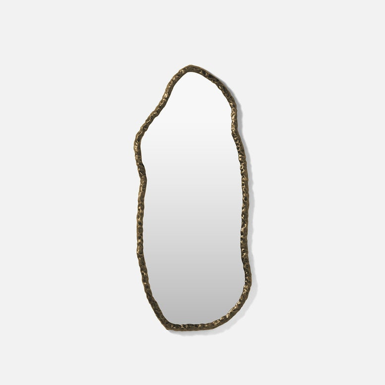 Decorative mirror with a unique, organic frame on a white background