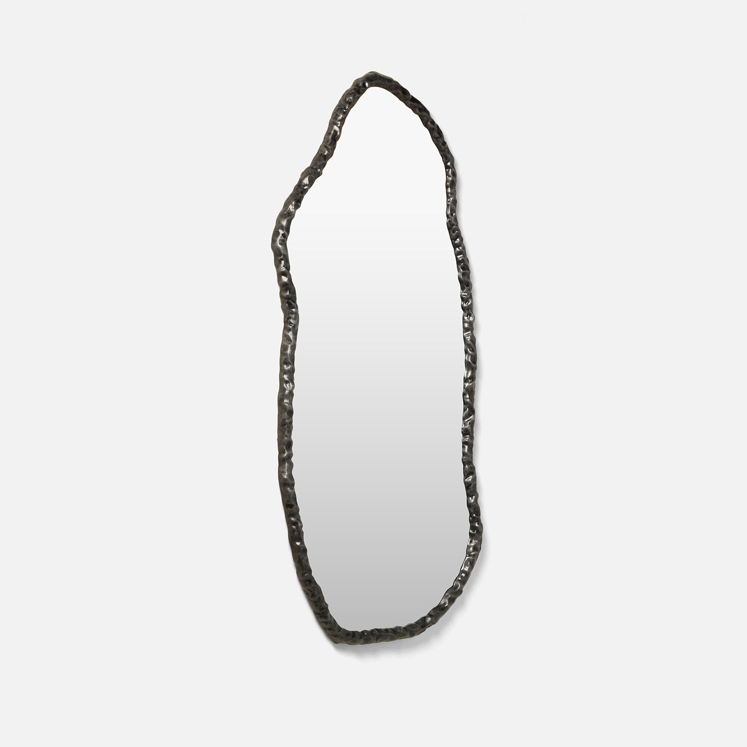 Decorative mirror with a textured frame on a light gray background