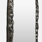 Two metallic objects with textured surfaces on a white background