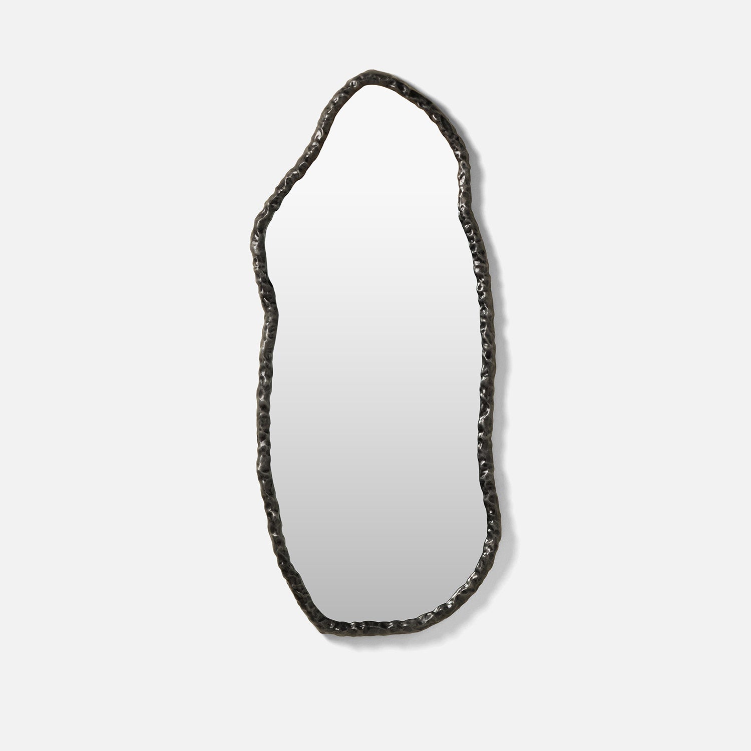 Decorative mirror with a unique, organic frame on a white background