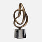 Bronze abstract sculpture on a white background