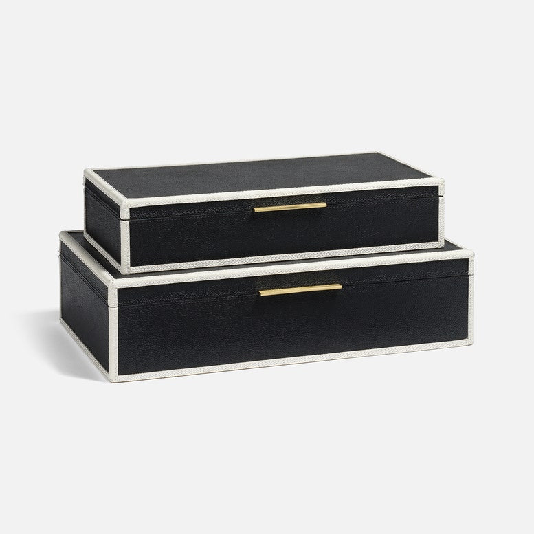 Two black jewelry boxes with gold accents on a white background