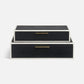 Two black jewelry boxes with gold accents on a white background