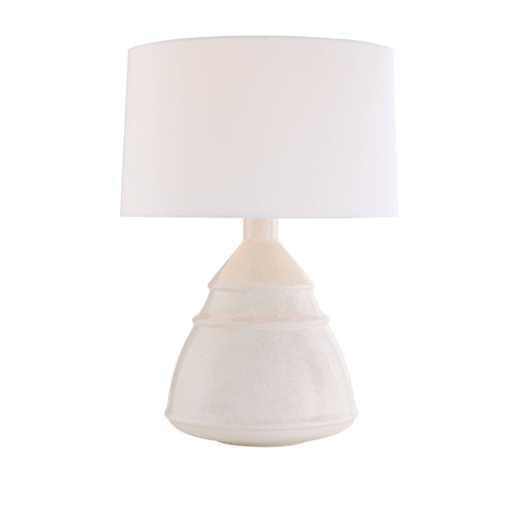 White table lamp with a textured base on a white background
