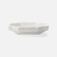 Hexagonal marble dish on a white background