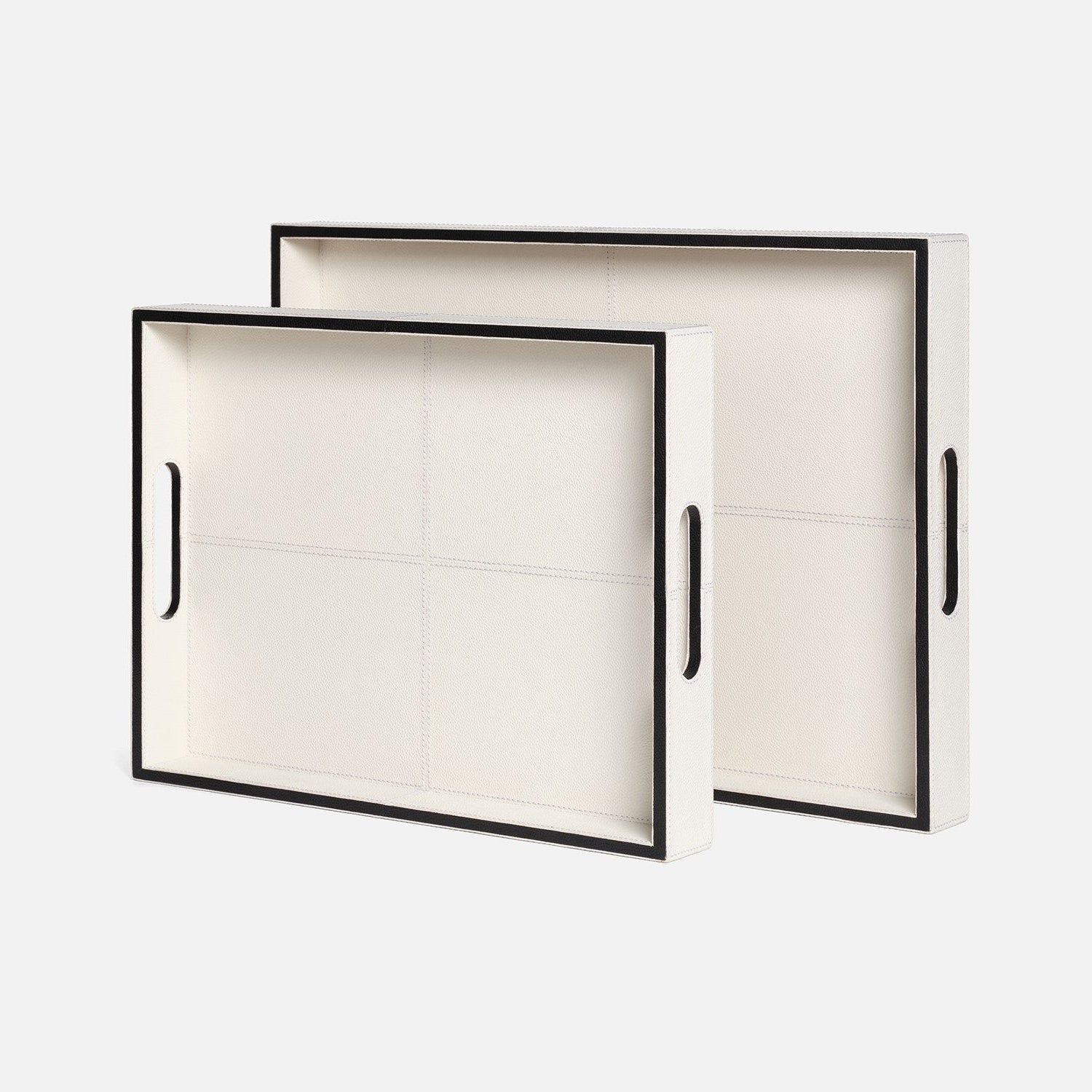 Two white trays with black frames and handles on a white background