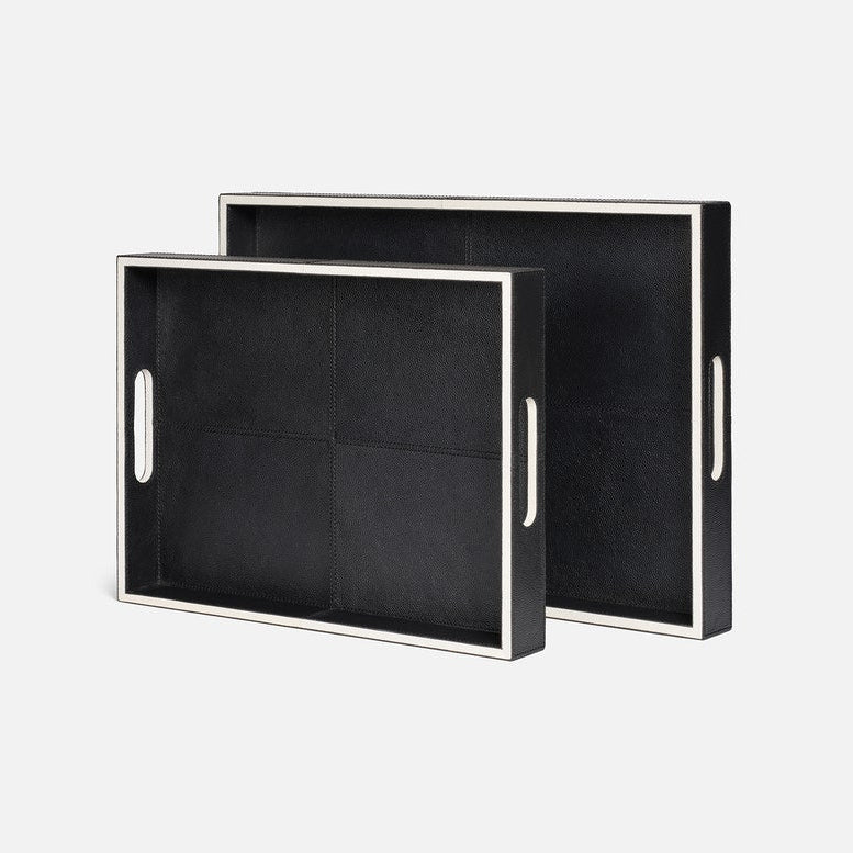 Two black trays with white handles on a white background
