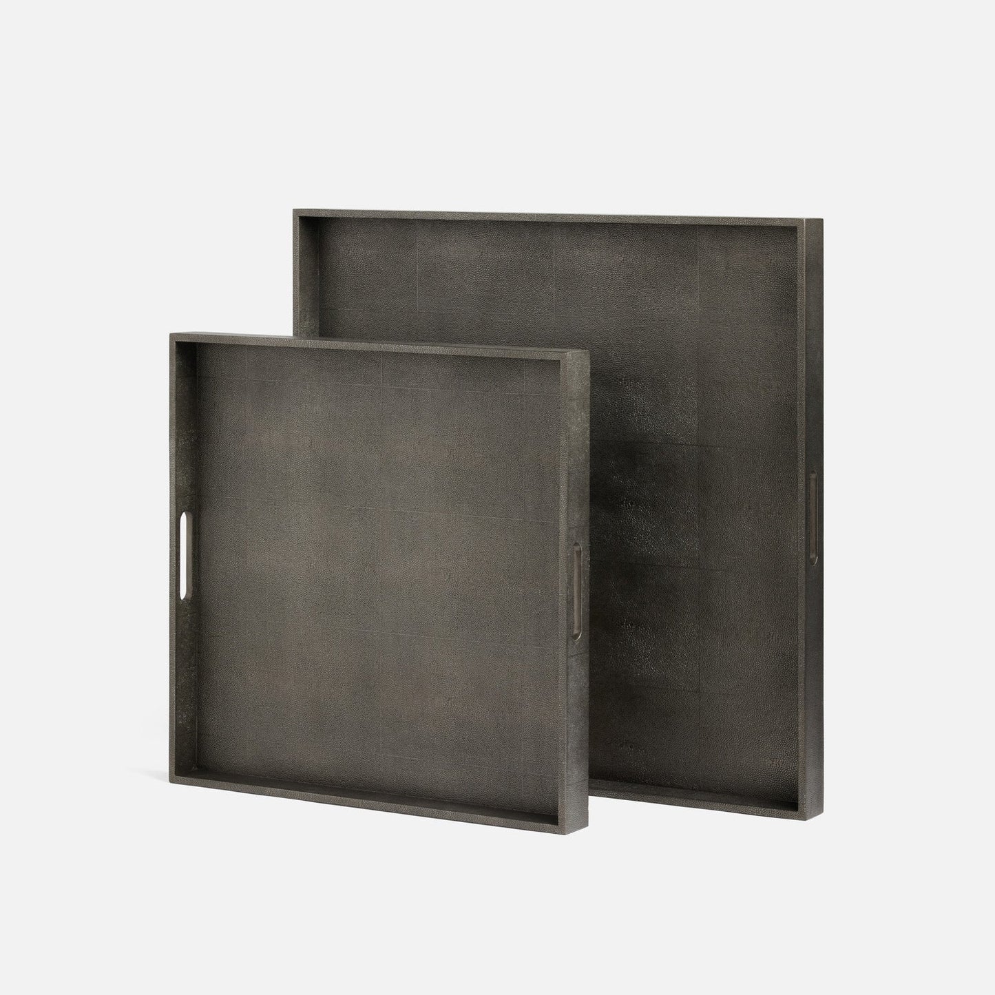 Two dark gray trays on a light gray background