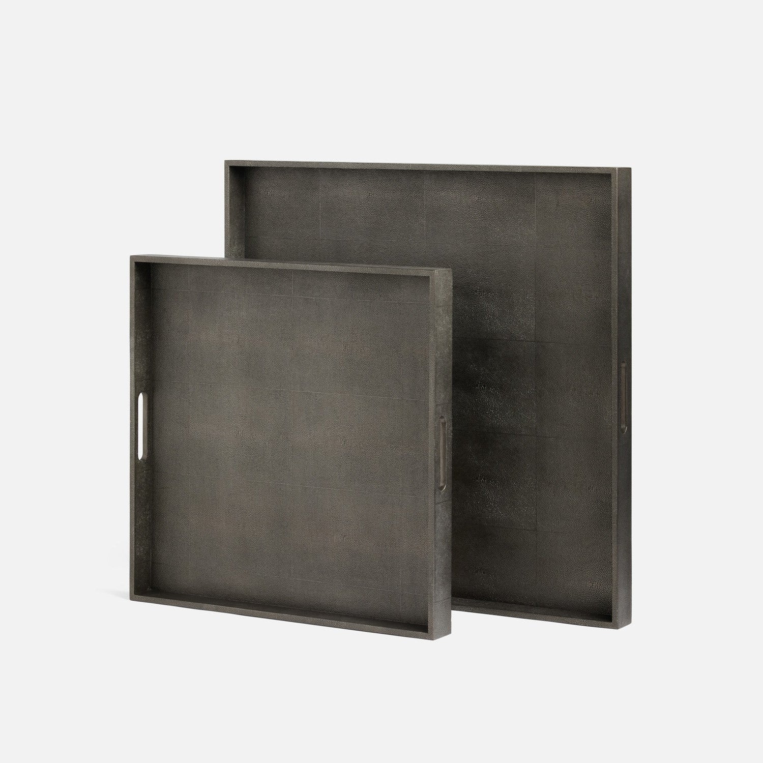 Two dark gray trays on a light gray background