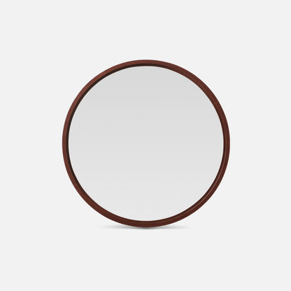 Round mirror with a leather frame on a white background